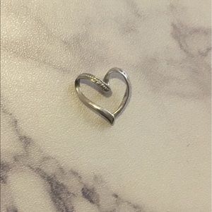 14kt white gold heart pendant with a small diamond